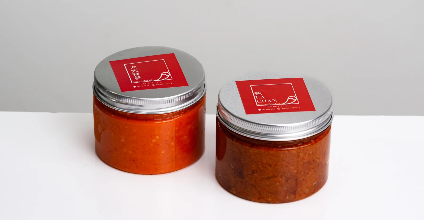 Signature chilli and Sambal Belacan jars side by side